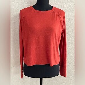 Beyond Yoga burnt orange long sleeve crop top